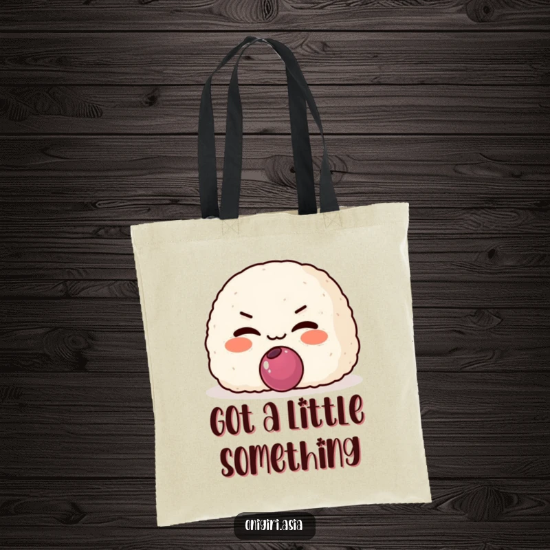 Funny Mischievous Onigiri Tote Bag depicting a grinning rice ball character offering a plum, great for carrying secrets.